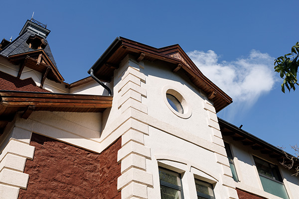 historical building with unique architectural details and a clear blue sky showcasing design elements and structure 6 features